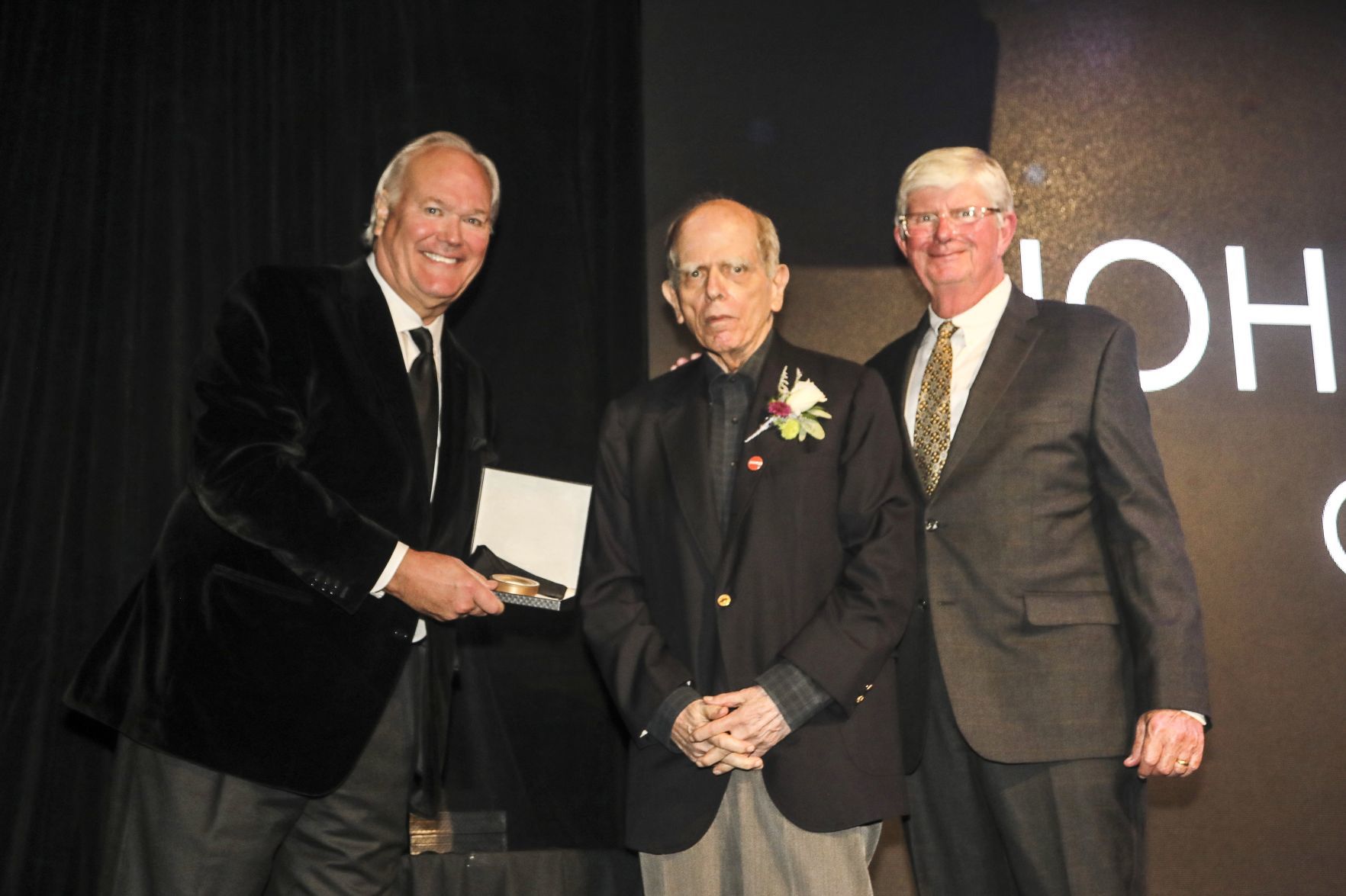 Dick Miles, Chairman of the Board, John Loengard, honoree, Bob Bishop, chair of induction committee and board member